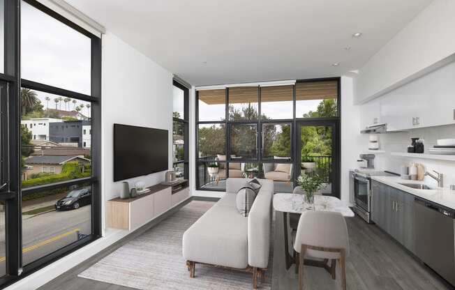 Living room with large window at Edendale Crossing, California