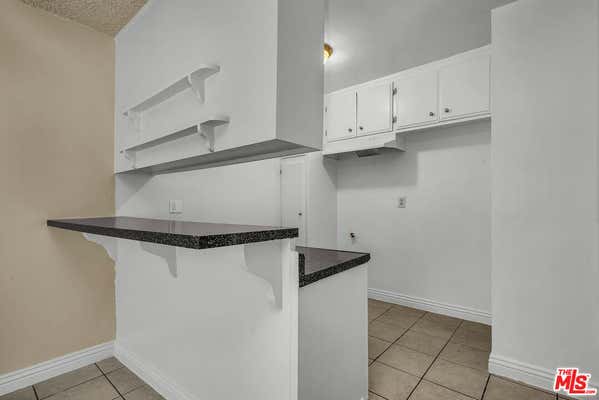 1087 W 39 ST