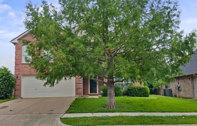 Wonderful two story with a huge yard!