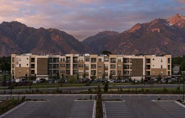 View of Parc View Apartments & Townhomes During Sunset Among the Mountains
