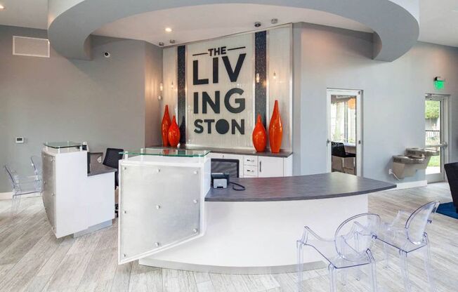 A modern kitchen with a sign that says "The Livingston".