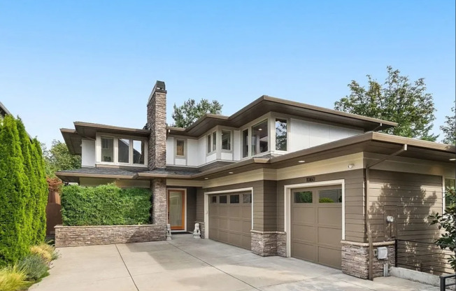Luxurious Modern Retreat with Builder Upgrades and Top-of-the-Line Appliances in Coveted Portland Neighborhood!