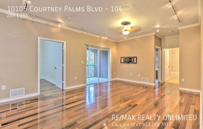 10105 COURTNEY PALMS BLVD