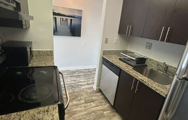 Now Leasing: 1-bedroom and 1.5 bath condo with a private balcony. Ideally located in the heart of West Palm Beach