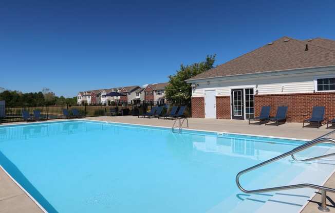 our apartments have a resort style pool with chairs