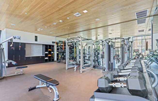 Gym with cardio equipment and weights at Array La Mesa, La Mesa, CA