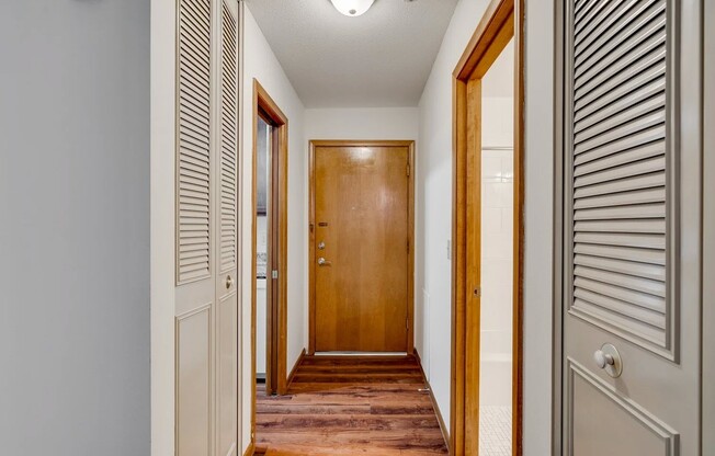 Elevate your living at Central Lakes of Uptown, where contemporary design meets comfort. This inviting hallway leads to stylish interiors that reflect modern elegance. Schedule a tour today and envision your new home!