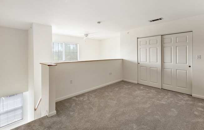 Orchards Apartments Marlborough ma apartment loft style apartments photo of loft bedroom workspace home office area with carpet and white walls and storage closet