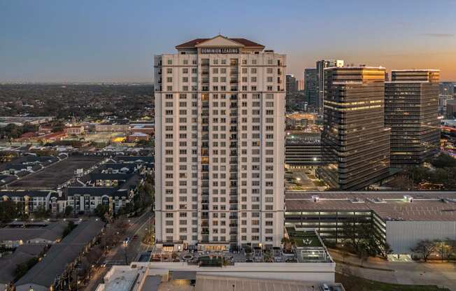 an aerial view of the Dominion Post Oak at dusk in Houston, TX