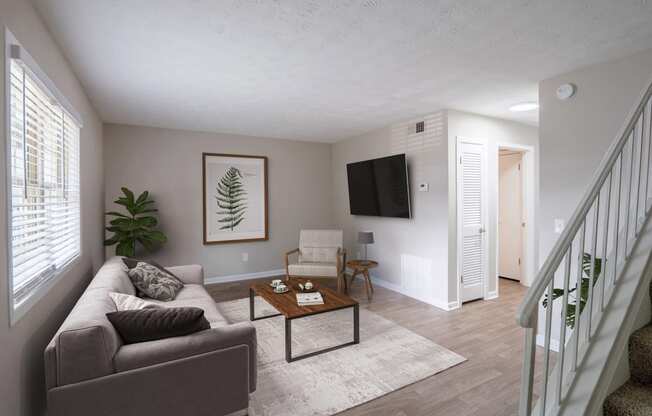 a living room with a couch and a coffee table