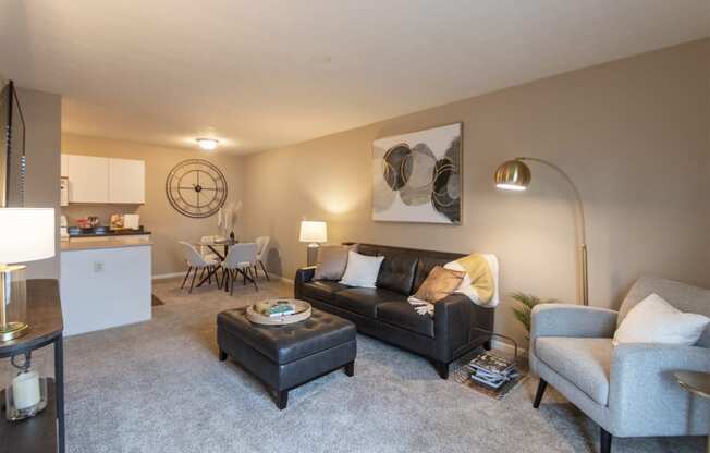 This is a photo of the living room of the 890 square foot 2 bedroom, 2 bath Liberty at Washington Place Apartments in in Miamisburg, Ohio in Washington Township.