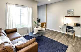 Living Room with natural lighting at Hanover Flats in Bennington, NE