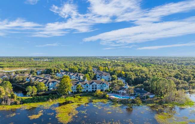 a view from above of a lake with houses on it