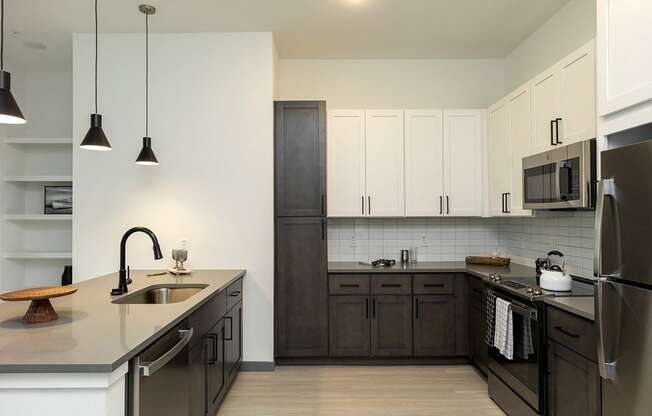 Modern kitchen with sleek design and stainless steel appliances in Apollo Beach, Florida.