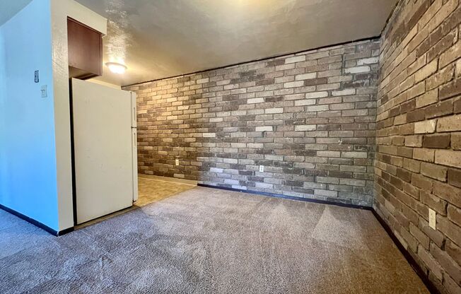 Amazing One Bedroom on the Second Floor! Built in A/C, Exposed Brick & More! Call Today!