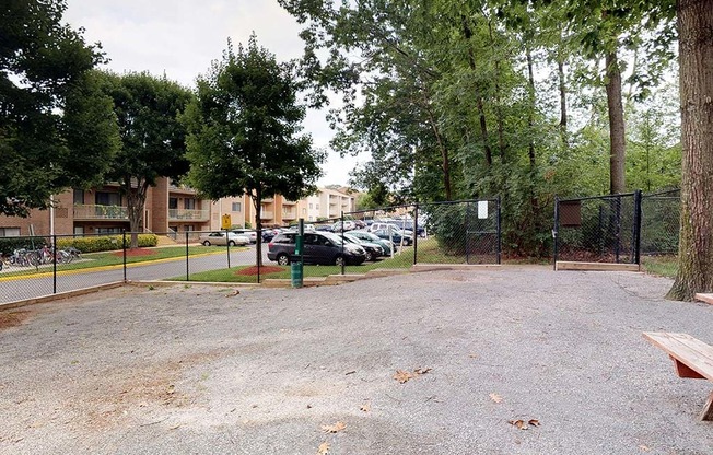 Outdoor park area for residents with benches at Gainsborough Court Apartments, Fairfax, Virginia