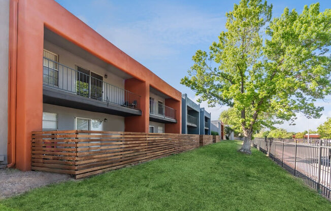 Exterior Community Building and Landscape at Indigo Park Apartments in Albuquerque, NM.