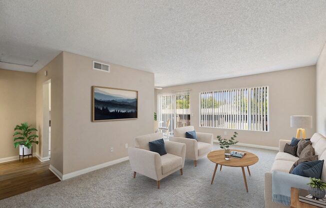 the living room of an apartment with couches and a table