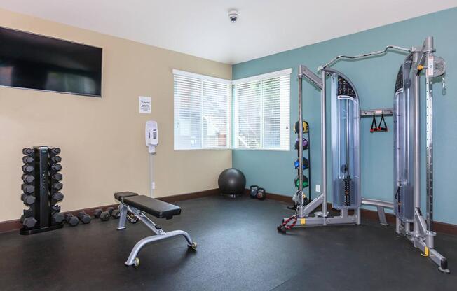 a room filled with furniture and a large window