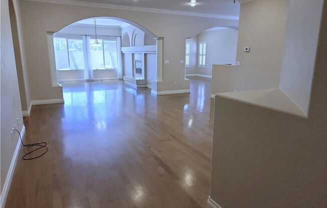 EXQUISITE SEM-CUSTOM HOME ON 1/2 ACRE IN GATED NW COMMUNITY