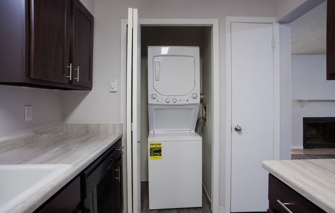 Washer and dryer in a small room in a kitchen  at Governor's Park, Fort Collins, 80525