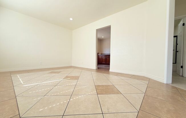 Spacious 4-Bedroom, 2-Bath Gated Home with Garage & Private Backyard