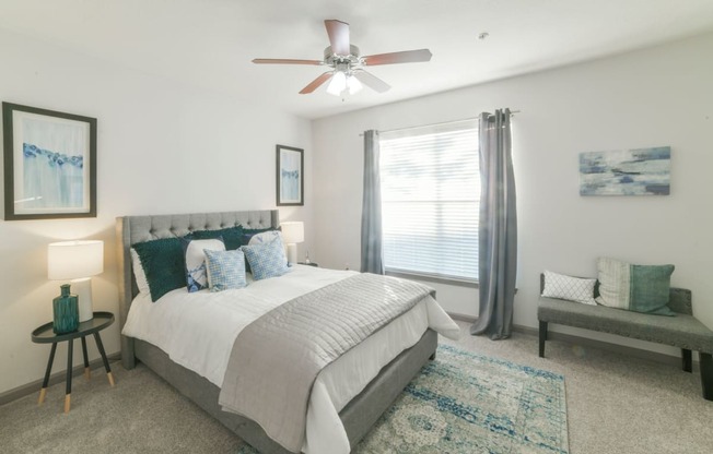 a bedroom with a bed and a ceiling fan at The Shallowford, Chattanooga, Tennessee