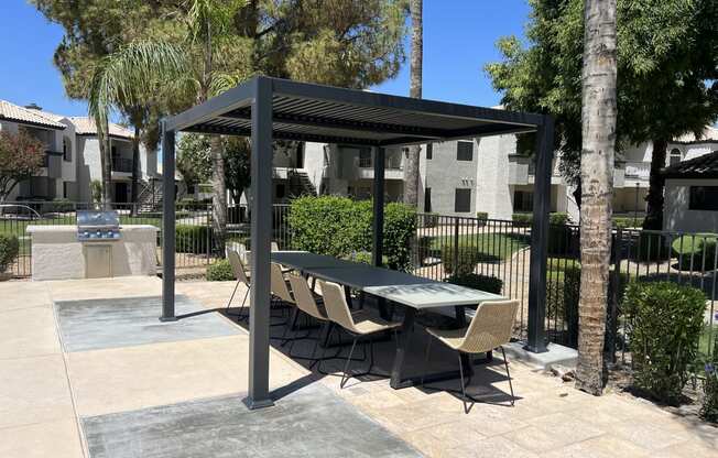 An ideal lounge setting for poolside enjoyment at Boulders at Lookout Mountain Apartment Homes, Arizona, 85022