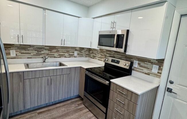 ROISMAN, AVRAHAM M TRSTEE ETAL - 100 SW 9 St