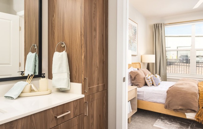 Bathroom with view to bedroom and ample storage