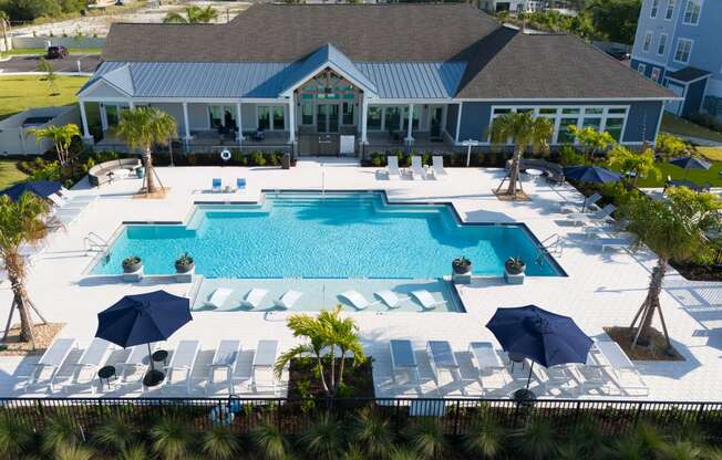 an aerial view of the pool at the resort at longboat key club