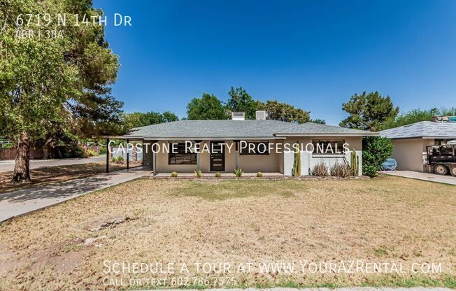6719 N 14 DR