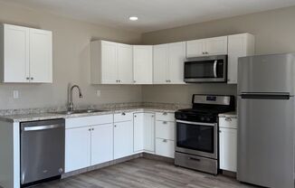 Updated 2BD/1BA Apartment with In-Unit Laundry + 2 Parking Spots - 1/2 Off Second Month's Rent