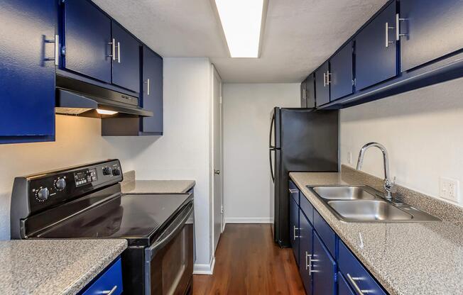 a modern kitchen with stainless steel appliances