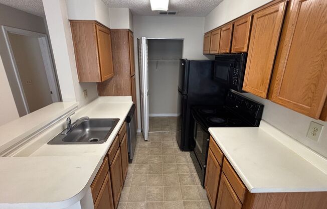2BR/2BA Tradewinds Condo with Wood Floors - Priced to Rent!