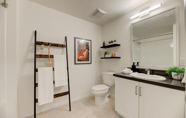 a kitchen with a sink and a mirror