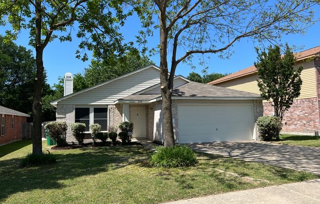 Happy home with a spacious floor plan that backs up to a greenbelt!