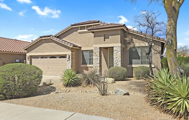 Amenity rich Estrella Mountain Ranch Home with SOLAR!