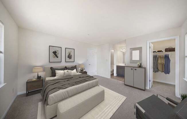 Bedroom with cozy bed at The Apartments at Owings Run, Owings Mills, MD, 21117