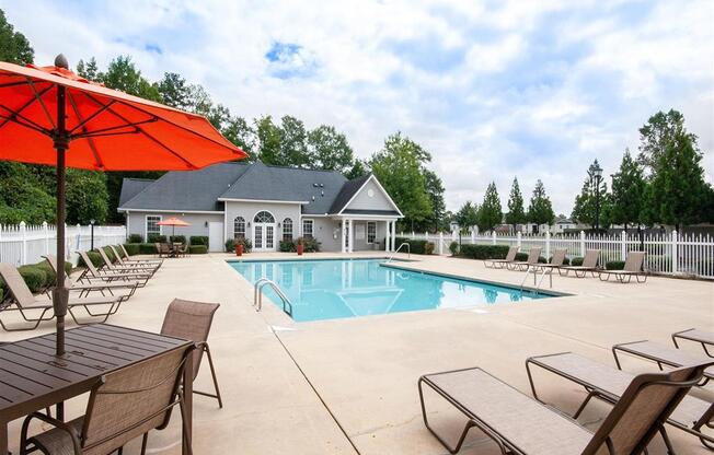 pool with lounge chairs