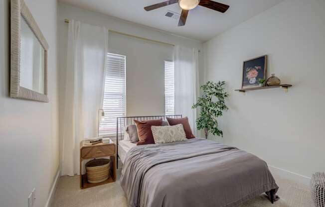Bedroom With Ceiling Fan at The Lincoln Apartments, Raleigh, NC