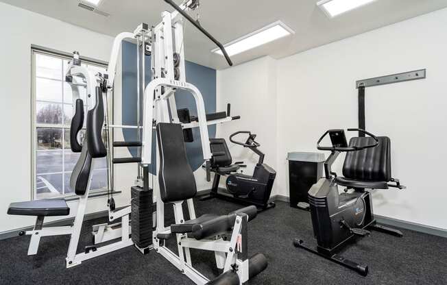 fitness center with adjustable weight lifting equipment