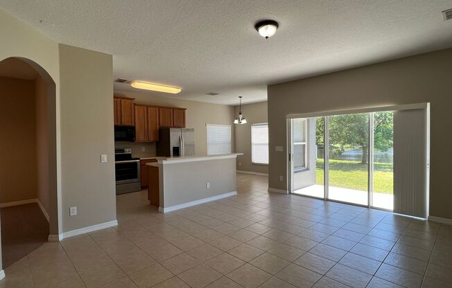 Beautiful 4 Bedroom 3 Bathroom Lake View Home in Gated Community of Timber Isle