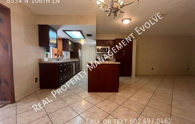 8534 N 106 LN