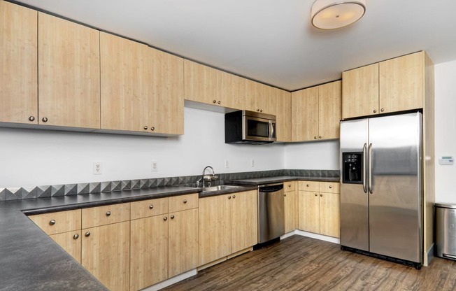 kitchen with stainless steel appliances at Avenue Two Apartments, Redwood City  , California