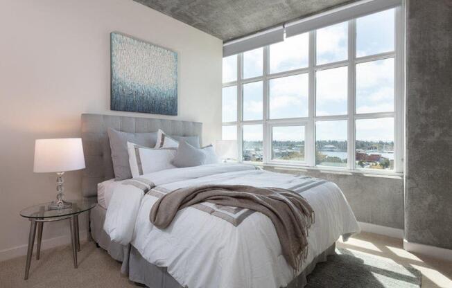 Two Bedroom Apartments in Oakland CA - Aqua Via - Bedroom with Plush Carpeting and a Large Window for Maximum Sunlight