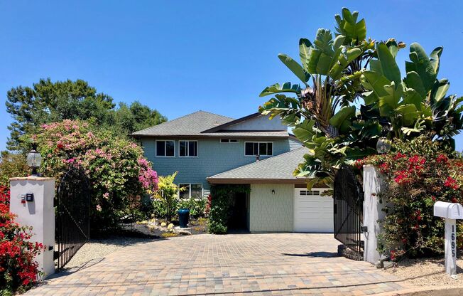 Exceptional Oceanside Retreat with Ocean Views, Resort-Style Outdoor Living & Spacious Interior