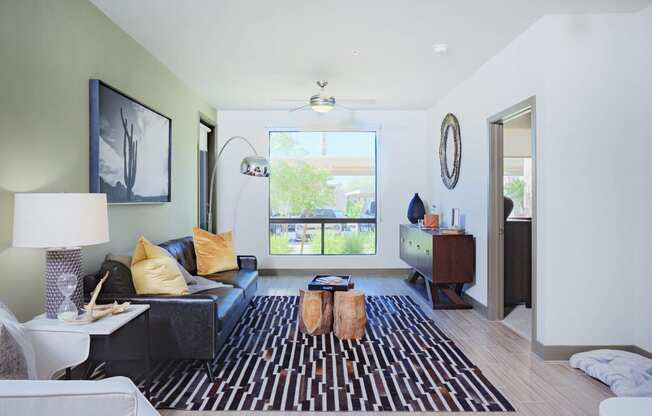 Living Room With TV at Audere Apartments, Phoenix