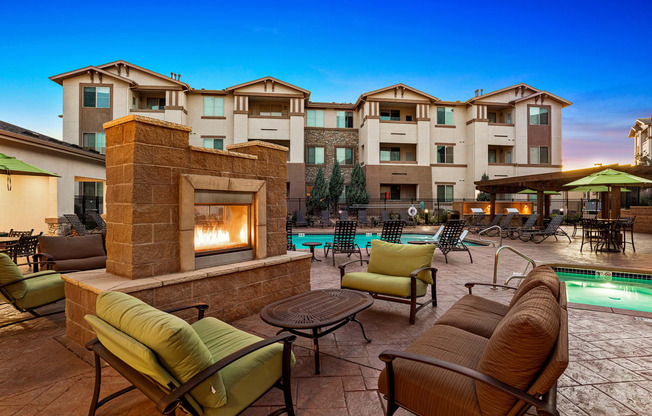 First and Main Apartments poolside fireplace lounge