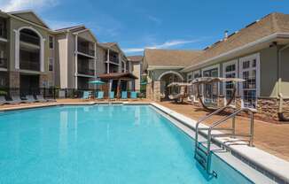 Refreshing swimming pool at Angel Landing apartments in Pensacola, FL